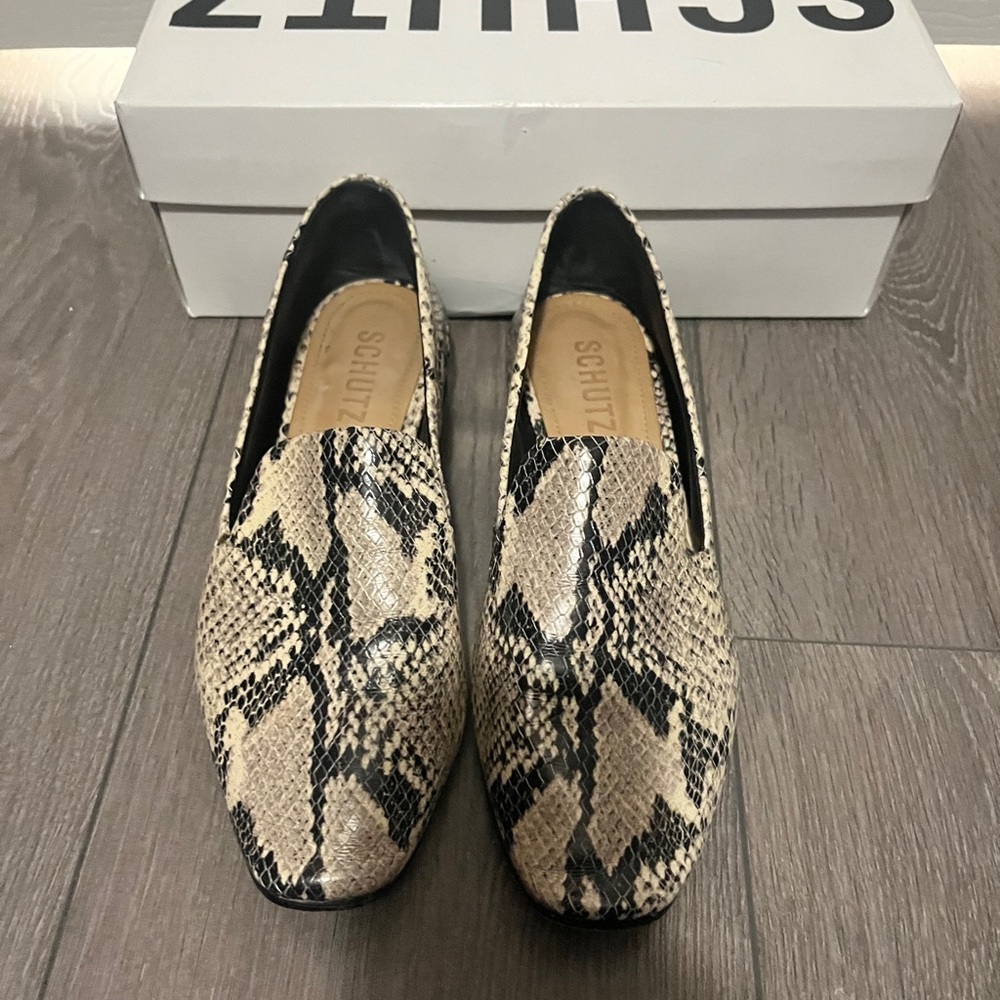 Schutz snakeskin print leather loafers.